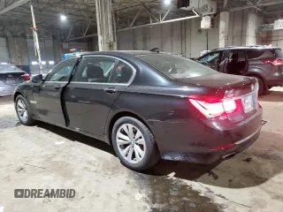 2015 BMW 7 Series 740Li xDrive with VIN WBAYF4C55FG291706, listed as a Copart auction lot 41992355 with 76,483 mi miles and Salvage Title. Bid and sale history available at carsss.com. Image 2.
