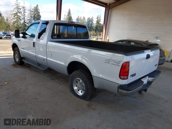 2000 Ford F-250 XL with VIN 1FTNX21F4YEC30722, listed as a IAAI auction lot 41409384 with 310,516 mi miles and . Bid and sale history available at DreamBid. Image 3.