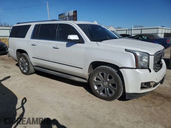 2016 GMC Yukon XL Denali with VIN 1GKS2HKJ5GR225936, listed as a Copart auction lot 49353985 with 207,658 mi miles and Salvage Title. Bid and sale history available at DreamBid. Image 4.