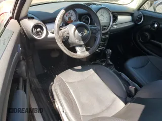 2012 MINI Hardtop with VIN WMWSU3C5XCT261853, listed as a Copart auction lot 49980285 with 110,638 mi miles and Salvage Title. Bid and sale history available at DreamBid. Image 8.