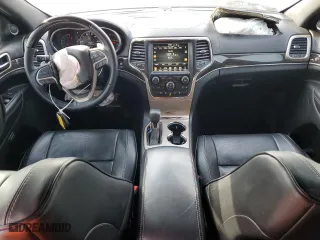 2017 Jeep Grand Cherokee Overland with VIN 1C4RJECG3HC868255, listed as a Copart auction lot 83041054 with 121,604 mi miles and Salvage Title. Bid and sale history available at carsss.com. Image 8.