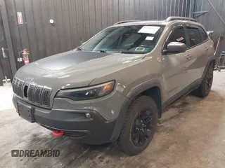 2019 Jeep Cherokee Trailhawk Elite with VIN 1C4PJMBX8KD458989, listed as a IAAI auction lot 41881517 with 89,045 mi miles. Bid and sale history available at carsss.com. Image 19.