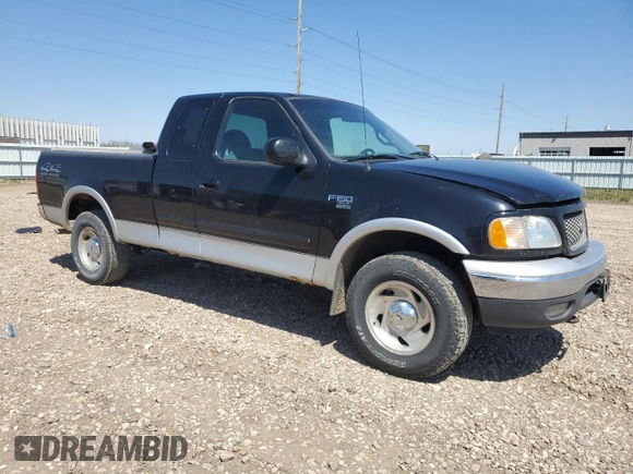2000 Ford F-150 XL with VIN 2FTRX18L2YCA62429, listed as a Copart auction lot 56033895 with 180,156 mi miles and Non repairable. Bid and sale history available at DreamBid. Image 4.