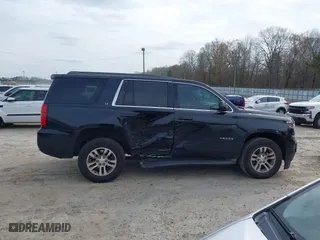 2016 Chevrolet Tahoe LT with VIN 1GNSCBKCXGR100381, listed as a IAAI auction lot 41542315 with 228,506 mi miles. Bid and sale history available at carsss.com. Image 13.