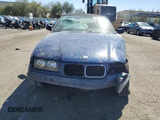 1998 BMW 3 Series 323ic with VIN WBABJ7321WEA16988, listed as a Copart auction lot 73016994 with 146,818 mi miles and Salvage Title. Bid and sale history available at carsss.com. Image 5.