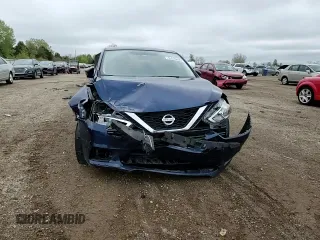 2018 Nissan Sentra SV z VIN 3N1AB7AP0JL624469, wystawiony jako Copart lot #55520425 z przebiegiem 54 779 mil mil oraz Szkoda całkowita • Salvage title. Historia ofert i sprzedaży dostępna na DreamBid. Obrazek 13.