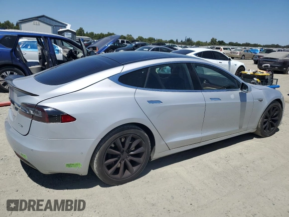 2016 Tesla Model S 90D с VIN 5YJSA1E23GF144496, выставлен на аукционе Copart как лот 64080845 с пробегом 34 847 миль миль и Списание • Salvage title. История ставок и продаж доступна на DreamBid. Изображение 3.