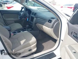 2010 Ford Fusion Hybrid with VIN 3FADP0L33AR392806, listed as a IAAI auction lot 41811194 with 131,627 mi miles. Bid and sale history available at carsss.com. Image 5.