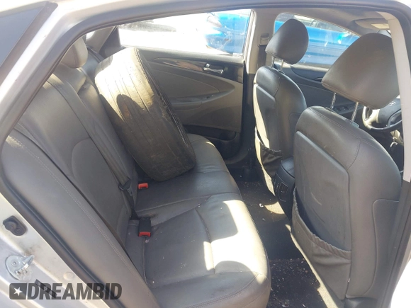 2012 Hyundai Sonata Limited z VIN 5NPEC4AC2CH469899, wystawiony jako IAAI lot #42008219 z przebiegiem 167 679 mil mil oraz . Historia ofert i sprzedaży dostępna na DreamBid. Obrazek 8.