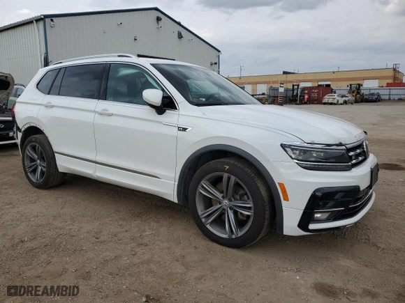 2020 Volkswagen Tiguan SEL Premium R-Line with VIN 3VV4B7AX8LM033024, listed as a Copart auction lot 77354494 with 127,247 mi miles and Salvage Title. Bid and sale history available at carsss.com. Image 4.