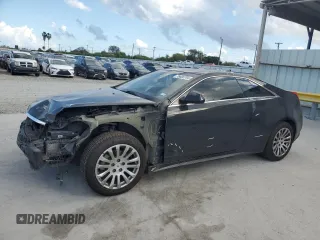 2014 Cadillac CTS Coupe Premium with VIN 1G6DH1E35E0107588, listed as a Copart auction lot 76608704 with 163,564 mi miles and Salvage Title. Bid and sale history available at carsss.com. Image 1.