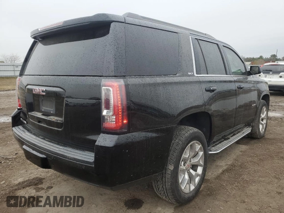2018 GMC Yukon SLT with VIN 1GKS1BKC6JR389995, listed as a Copart auction lot 86239214 with 164,434 mi miles and Salvage Title. Bid and sale history available at carsss.com. Image 3.