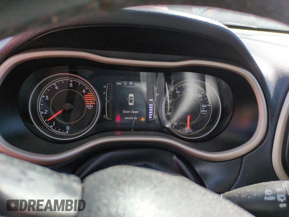 2016 Jeep Cherokee Altitude with VIN 1C4PJMAB3GW317104, listed as a Copart auction lot 50328385 with 161,234 mi miles and Salvage title. Bid and sale history available at DreamBid. Image 9.