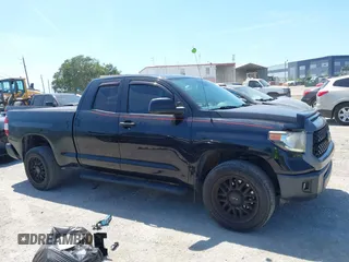 2019 Toyota Tundra SR with VIN 5TFUY5F13KX852912, listed as a IAAI auction lot 42327399 with 124,193 mi miles and . Bid and sale history available at DreamBid. Image 13.