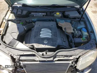 1999 Volkswagen Passat GL z VIN WVWMD63BXXE058992, wystawiony jako Copart lot #57342545 z przebiegiem 89 523 mil mil oraz Szkoda całkowita • Salvage title. Historia ofert i sprzedaży dostępna na DreamBid. Obrazek 11.