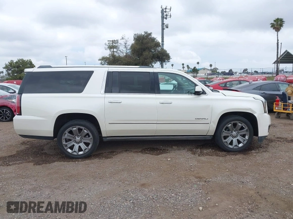 2015 GMC Yukon XL Denali with VIN 1GKS2JKJ7FR641430, listed as a IAAI auction lot 42163969 with 129,085 mi miles. Bid and sale history available at carsss.com. Image 13.