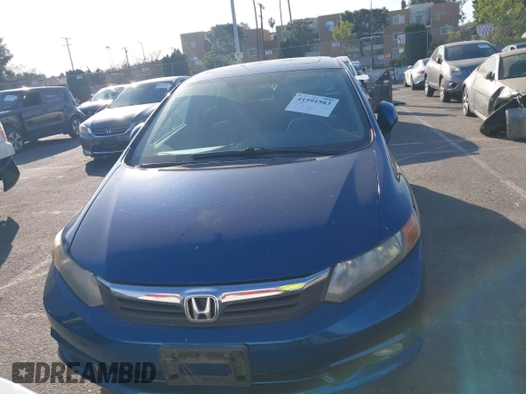 2012 Honda Civic EX with VIN 2HGFB2F88CH512765, listed as a IAAI auction lot 41591583 with 147,261 mi miles and . Bid and sale history available at DreamBid. Image 12.