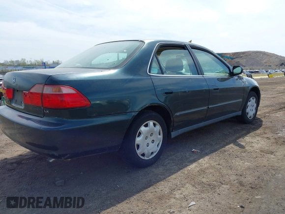 1999 Honda Accord LX with VIN 1HGCG6654XA145126, listed as a IAAI auction lot 42090873 with 76,421 mi miles and . Bid and sale history available at DreamBid. Image 4.