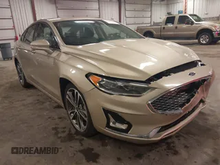 2019 Ford Fusion Titanium z VIN 3FA6P0D95KR120853, wystawiony jako IAAI lot #42731190 z przebiegiem 72 581 mil mil oraz . Historia ofert i sprzedaży dostępna na DreamBid. Obrazek 1.