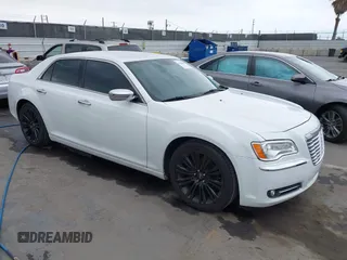 2012 Chrysler 300 Limited with VIN 2C3CCACG2CH237841, listed as a IAAI auction lot 42134640 with 140,554 mi miles. Bid and sale history available at carsss.com. Image 1.