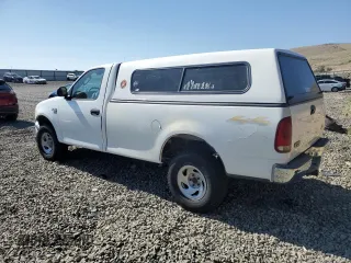2004 Ford F-150 XL with VIN 2FTRF18W54CA36334, listed as a Copart auction lot 63464375 with 253,805 mi miles and Salvage title. Bid and sale history available at DreamBid. Image 2.