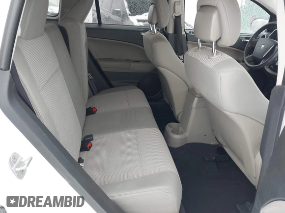 2011 Dodge Caliber Mainstreet with VIN 1B3CB3HAXBD237906, listed as a IAAI auction lot 41589696 with 135,909 mi miles and . Bid and sale history available at DreamBid. Image 8.