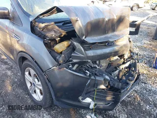 2016 Ford Escape SE z VIN 1FMCU0G72GUA42592, wystawiony jako IAAI lot #41603556 z przebiegiem 109 582 mil mil oraz . Historia ofert i sprzedaży dostępna na DreamBid. Obrazek 13.