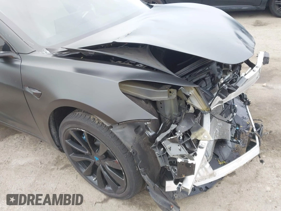 2019 Tesla Model 3 Mid Range with VIN 5YJ3E1EA8KF538083, listed as a IAAI auction lot 41891458 with 46,958 mi miles and . Bid and sale history available at carsss.com. Image 20.