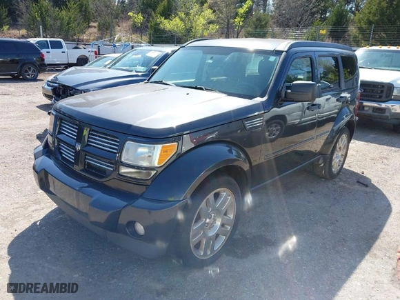 2011 Dodge Nitro Heat with VIN 1D4PU4GK6BW549562, listed as a IAAI auction lot 41992334 with 137,481 mi miles. Bid and sale history available at carsss.com. Image 2.