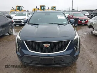 2022 Cadillac XT4 FWD Sport with VIN 1GYFZER44NF151862, listed as a IAAI auction lot 41429850 with 9,854 mi miles. Bid and sale history available at carsss.com. Image 12.