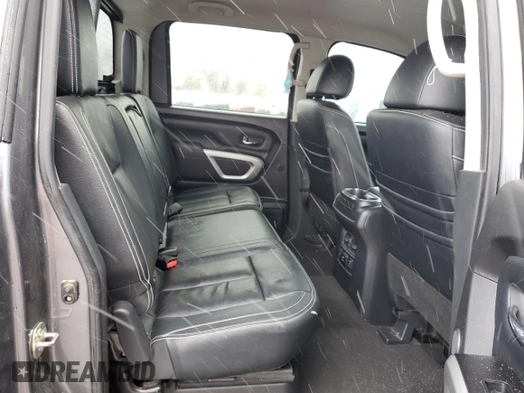 2018 Nissan Titan Pro-4X z VIN 1N6AA1E51JN536680, wystawiony jako Copart lot #82361724 z przebiegiem 98 699 mil mil oraz Szkoda całkowita • Salvage title. Historia ofert i sprzedaży dostępna na DreamBid. Obrazek 10.