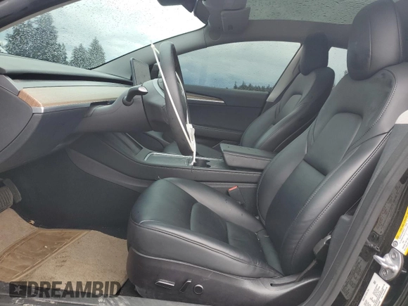2023 Tesla Model 3 with VIN 5YJ3E1EA2PF457667, listed as a Copart auction lot 57360035 with 53,962 mi miles and Salvage title. Bid and sale history available at DreamBid. Image 7.