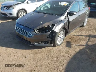 2016 Ford Focus SE with VIN 1FADP3F2XGL207906, listed as a IAAI auction lot 42099203 with 95,527 mi miles. Bid and sale history available at carsss.com. Image 6.