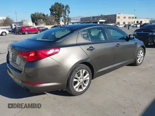 2013 Kia Optima LX with VIN 5XXGM4A74DG114626, listed as a IAAI auction lot 41349903 with 126,856 mi miles. Bid and sale history available at carsss.com. Image 4.