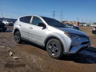 2018 Toyota RAV4 LE with VIN 2T3BFREV2JW730084, listed as a Copart auction lot 50386335 with 56,650 mi miles and Salvage Title. Bid and sale history available at carsss.com. Image 4.