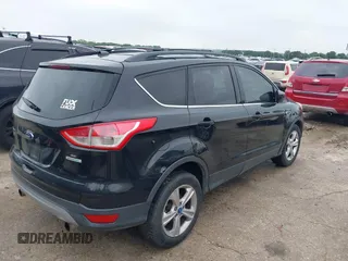 2013 Ford Escape SE with VIN 1FMCU0GX5DUB68604, listed as a IAAI auction lot 42126594 with 165,540 mi miles and . Bid and sale history available at carsss.com. Image 4.
