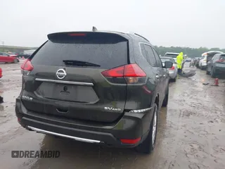 2017 Nissan Rogue SV with VIN KNMAT2MV1HP601384, listed as a IAAI auction lot 42454707 with 159,501 mi miles and . Bid and sale history available at DreamBid. Image 4.