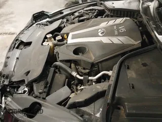 2016 Infiniti Q50 Premium z VIN JN1EV7ARXGM344082, wystawiony jako IAAI lot #42338189 z przebiegiem 86 633 mil mil oraz . Historia ofert i sprzedaży dostępna na DreamBid. Obrazek 20.