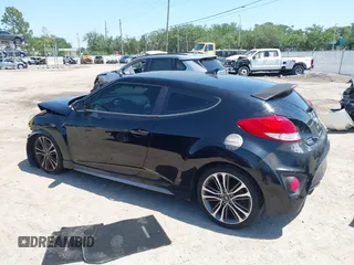 2016 Hyundai Veloster Turbo with VIN KMHTC6AE5GU281597, listed as a IAAI auction lot 42006038 with 77,642 mi miles. Bid and sale history available at carsss.com. Image 15.
