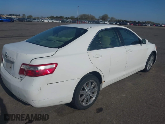 2007 Toyota Camry CE with VIN 4T1BE46KX7U517265, listed as a IAAI auction lot 42098343 with 131,541 mi miles. Bid and sale history available at carsss.com. Image 4.