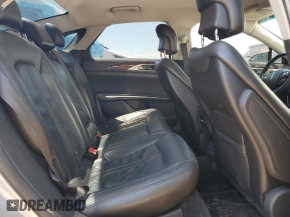 2013 Lincoln MKZ z VIN 3LN6L2GK6DR827247, wystawiony jako Copart lot #58029095 z przebiegiem 159 174 mil mil oraz Szkoda całkowita • Salvage title. Historia ofert i sprzedaży dostępna na DreamBid. Obrazek 10.