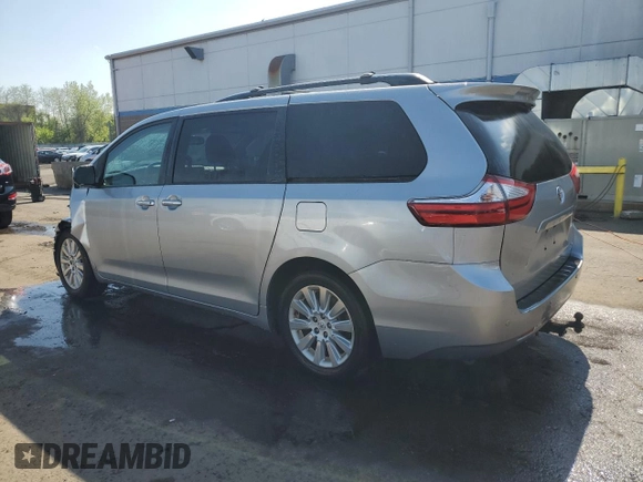 2015 Toyota Sienna Limited with VIN 5TDDK3DCXFS114708, listed as a Copart auction lot 55411465 with Not Provided miles and Salvage Title. Bid and sale history available at DreamBid. Image 2.