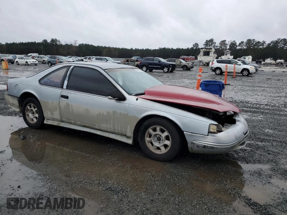 1990 Ford Thunderbird with VIN 1FAPP6046LH182637, listed as a Copart auction lot 82300484 with 149,365 mi miles and Salvage Title. Bid and sale history available at DreamBid. Image 4.