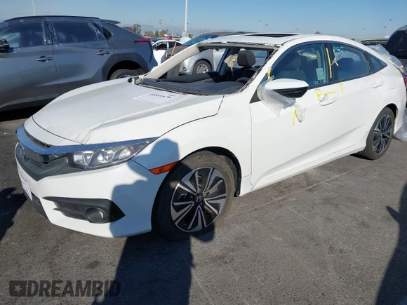 2017 Honda Civic EX-T with VIN 19XFC1E38HE002205, listed as a IAAI auction lot 40891678 with 10,398 mi miles and . Bid and sale history available at DreamBid. Image 2.