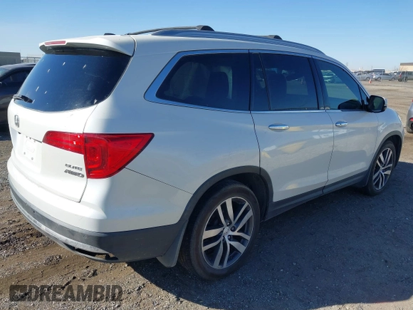 2017 Honda Pilot Elite with VIN 5FNYF6H02HB042160, listed as a IAAI auction lot 40893685 with Not Provided miles and . Bid and sale history available at DreamBid. Image 4.