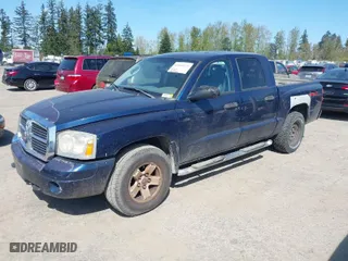 2006 Dodge Dakota SLT with VIN 1D7HW48NX6S708140, listed as a IAAI auction lot 42054527 with 226,944 mi miles. Bid and sale history available at carsss.com. Image 2.