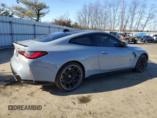 2022 BMW M4 with VIN WBS53AZ05NCK13109, listed as a Copart auction lot 43600854 with 12,285 mi miles. Bid and sale history available at carsss.com. Image 3.