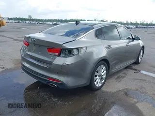 2018 Kia Optima EX with VIN 5XXGU4L36JG253629, listed as a IAAI auction lot 42079946 with 136,575 mi miles and . Bid and sale history available at carsss.com. Image 4.