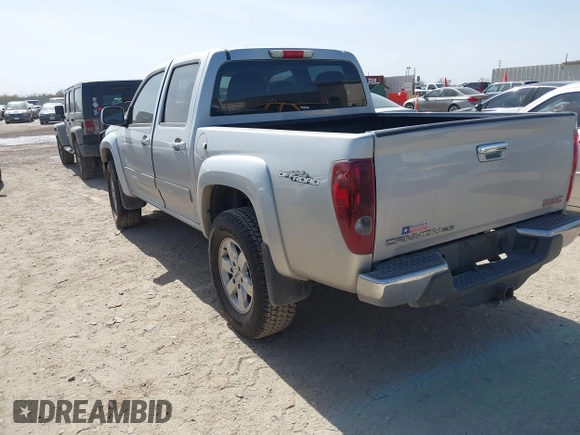 2010 GMC Canyon SLE1 z VIN 1GTJSCDEXA8130361, wystawiony jako IAAI lot #41734671 z przebiegiem 52 621 mil mil oraz . Historia ofert i sprzedaży dostępna na DreamBid. Obrazek 3.