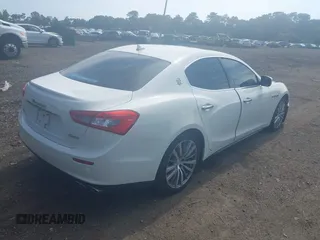 2015 Maserati Ghibli with VIN ZAM57XSA4F1148845, listed as a IAAI auction lot 42605057 with 69,446 mi miles and . Bid and sale history available at DreamBid. Image 4.
